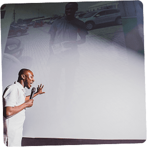 Jeffrey speaking on stage